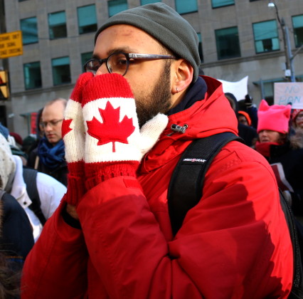 Hundreds march in Toronto to protest ban of Muslims from some countries from entering the US
