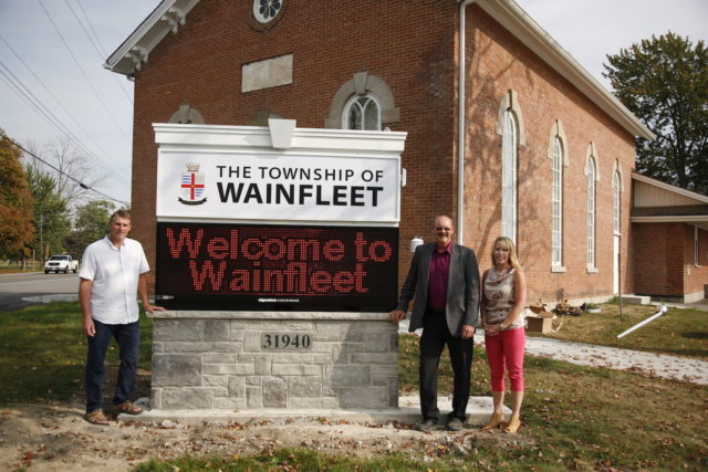 New Digital Signage in Wainfleet-Pictured are, from left to right: Alderman Richard Dykstra, Manager of Operations, Richard Nan and Mayor April Jeffs