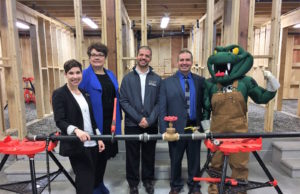 Michaud, VP – Academic at Collège Boréal, Anthony Davies, Owner of Greater Sudbury Plumbing, Daniel Giroux, Collège Boréal President and the college’s mascot, La Vipère. - photo supplied
