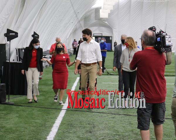 Trudeau in discussion with Chrystia Freeland, Minister of Finance. Photo Mosaic Edition Edward Akinwunmi