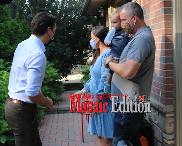 Trudeau greets family at backyard meet in Mississauga. Photo Mosaic Edition Edward Akinwunmi