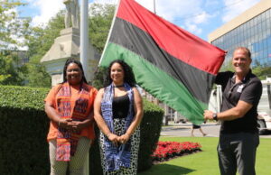 Emancipation Day is August 1 –St. Catharines raises Pan-African flag Natasha Bell, Erika Smith and Walter Sendzik – Mayor St. Catharines at Emancipation Day St. Catharines – raising of Pan African flag in front of city hall - Photo Mosaic Edition Edward Akinwunmi