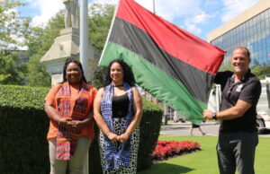 Natasha Bell, Erika Smith and Walter Sendzik – Mayor St. Catharines at Emancipation Day St. Catharines – raising of Pan African flag in front of city hall - Photo Mosaic Edition Edward Akinwunmi