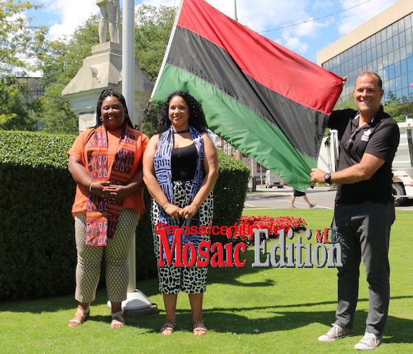 Emancipation Day–St. Catharines raises Pan-African Flag1 Natasha Bell, Erika Smith and Walter Sendzik – Mayor St. Catharines at Emancipation Day St. Catharines – raising of Pan African flag in front of city hall - Photo Mosaic Edition Edward Akinwunmi